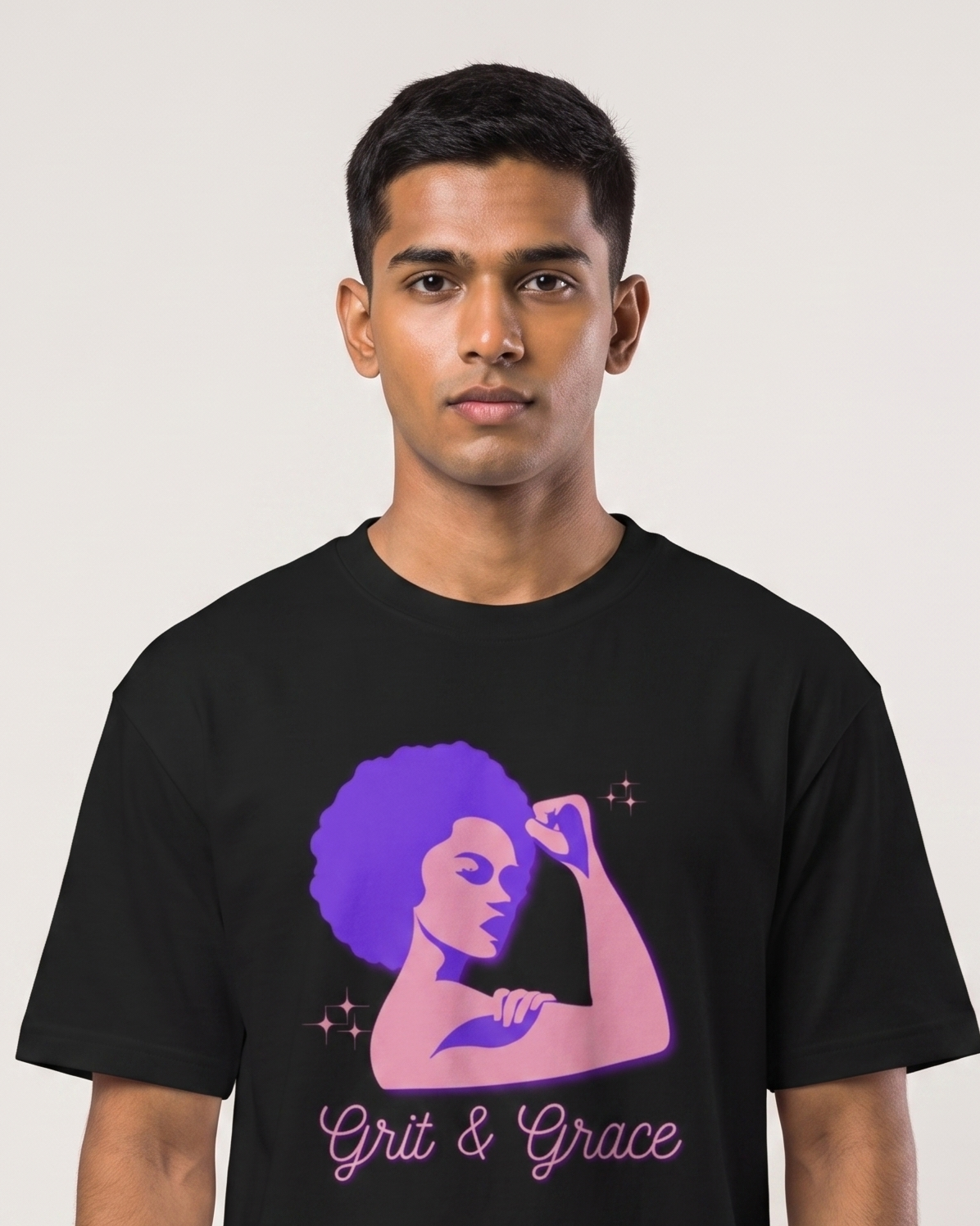 Grit & Grace - Black - Chapter26 premium oversized graphic t-shirt, worn by a model
