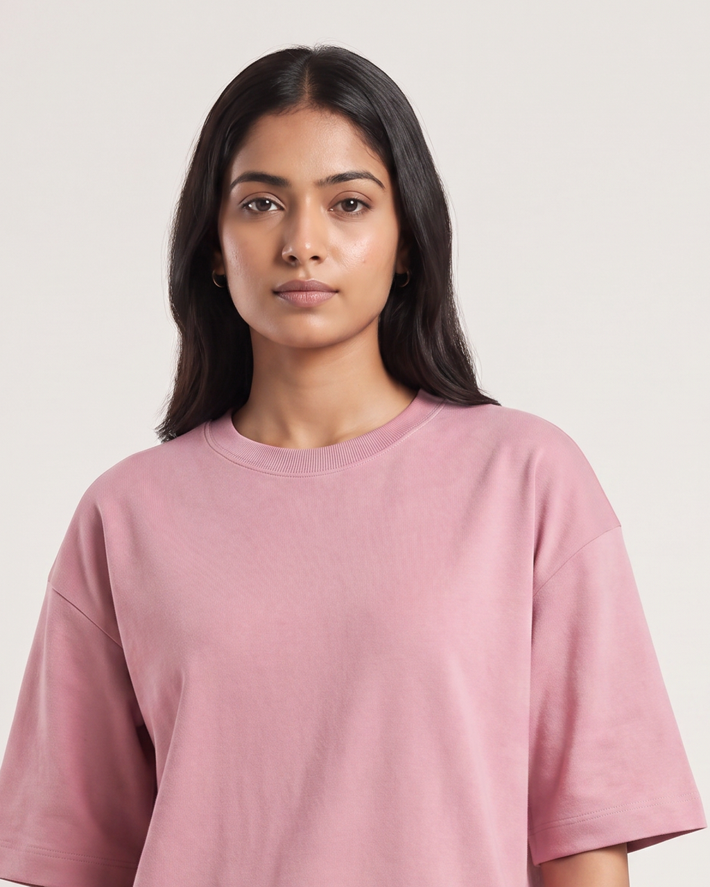 Plush Pink - Chapter26 premium oversized graphic t-shirt, worn by a female model