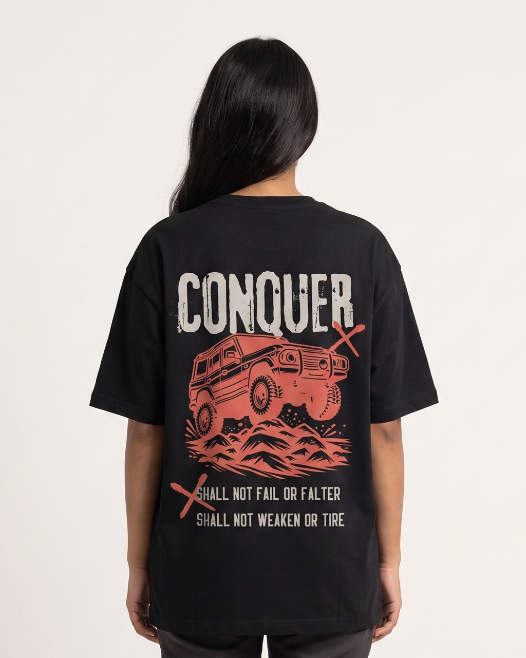 Conquer - Black - Chapter26 premium oversized graphic t-shirt, back print, worn by a female model