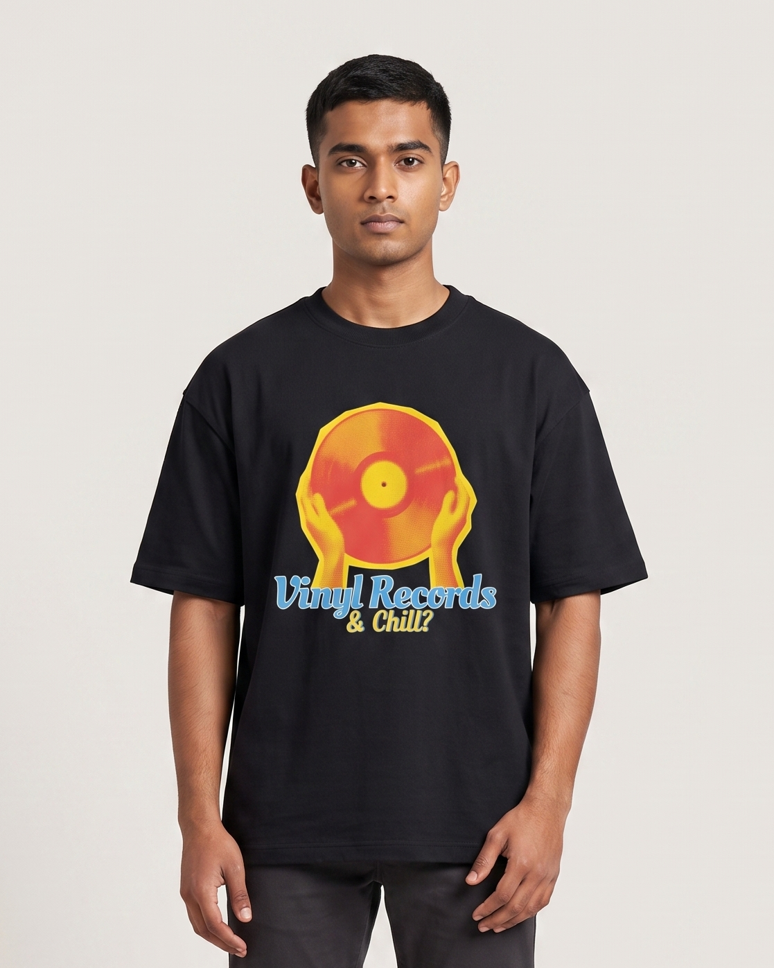 Vinyl & Chill - Black - Chapter26 premium oversized graphic t-shirt, worn by a model