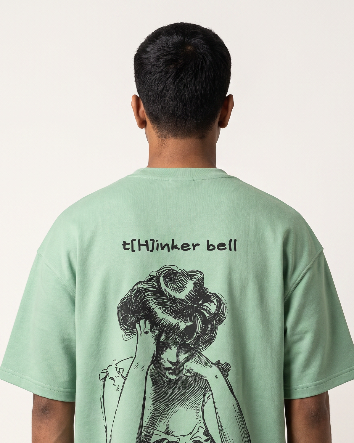 Thinker Bell - Jade - Chapter26 premium oversized graphic t-shirt, back print, worn by a model