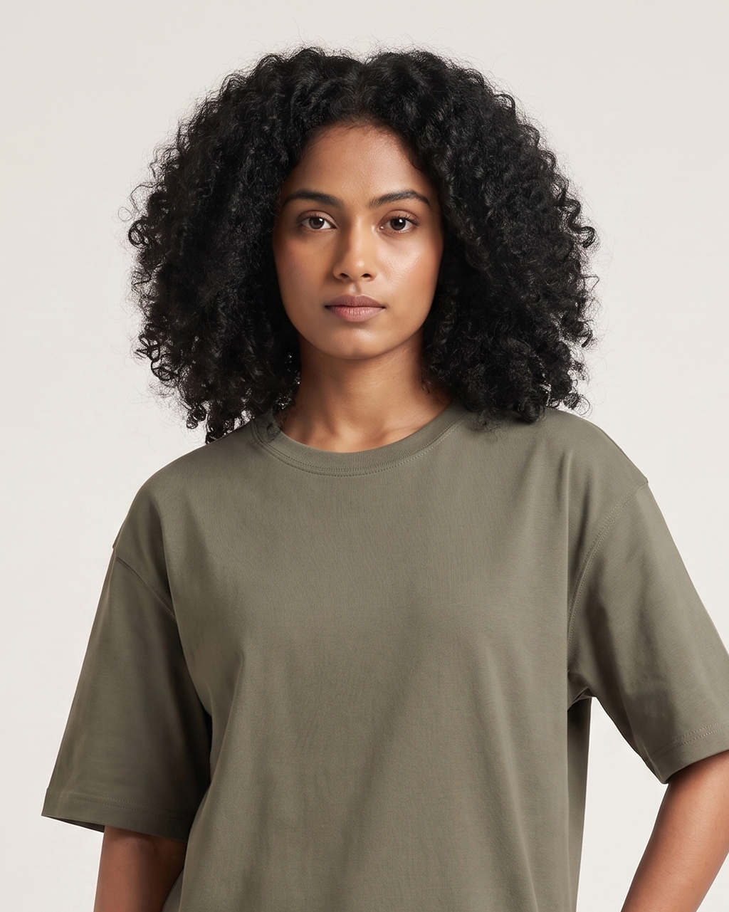 Olive - Chapter26 premium oversized graphic t-shirt, worn by a female model