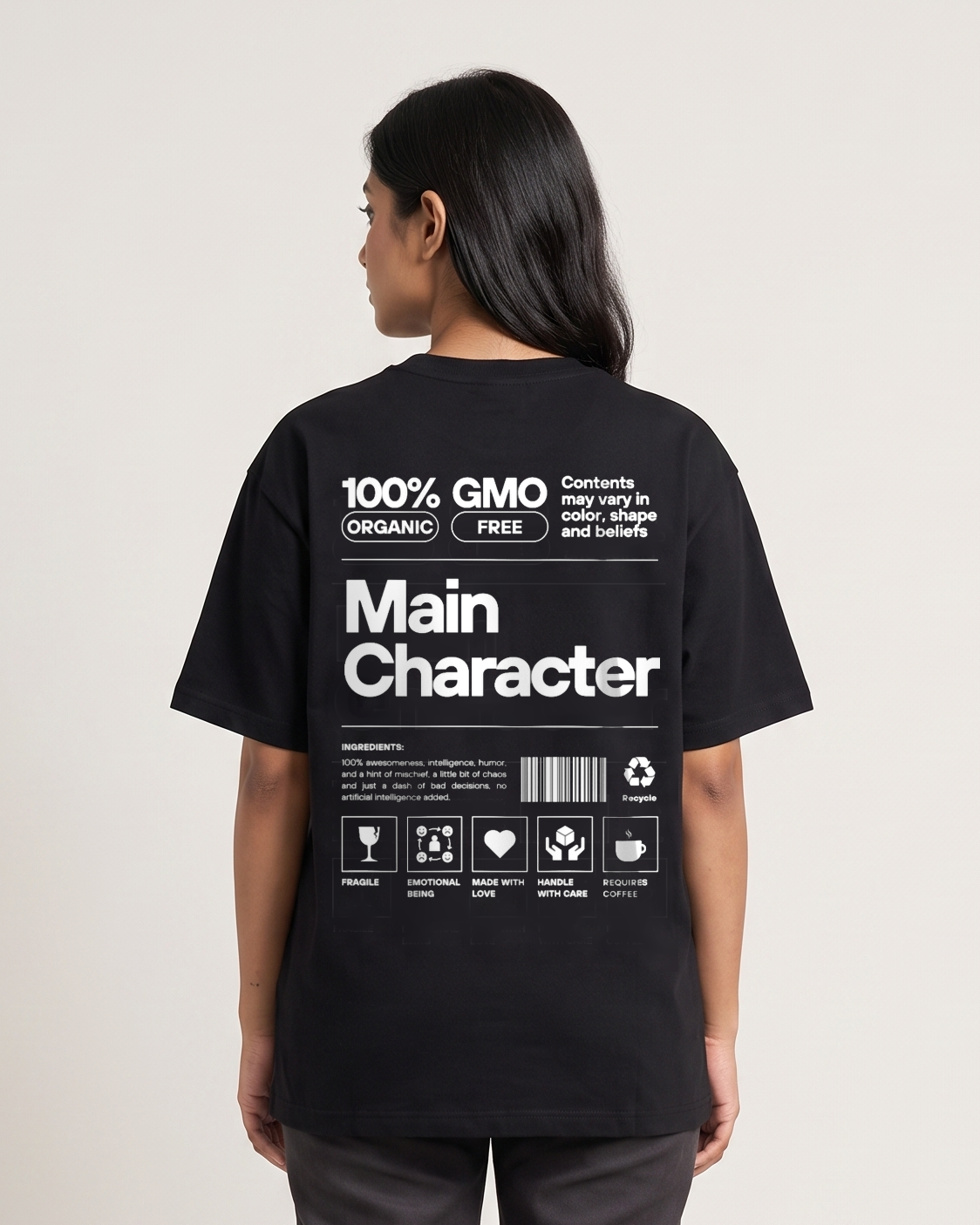 Main Character - Black - Chapter26 premium oversized graphic t-shirt, back print, worn by a female model