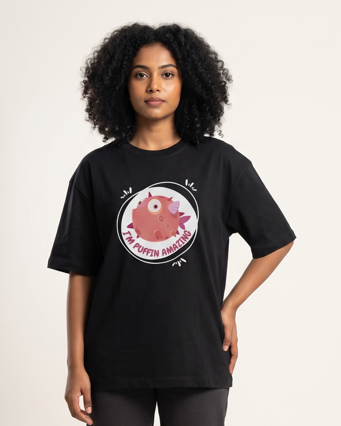 Puffin Amazing - Black - Chapter26 premium oversized graphic t-shirt, worn by a female model