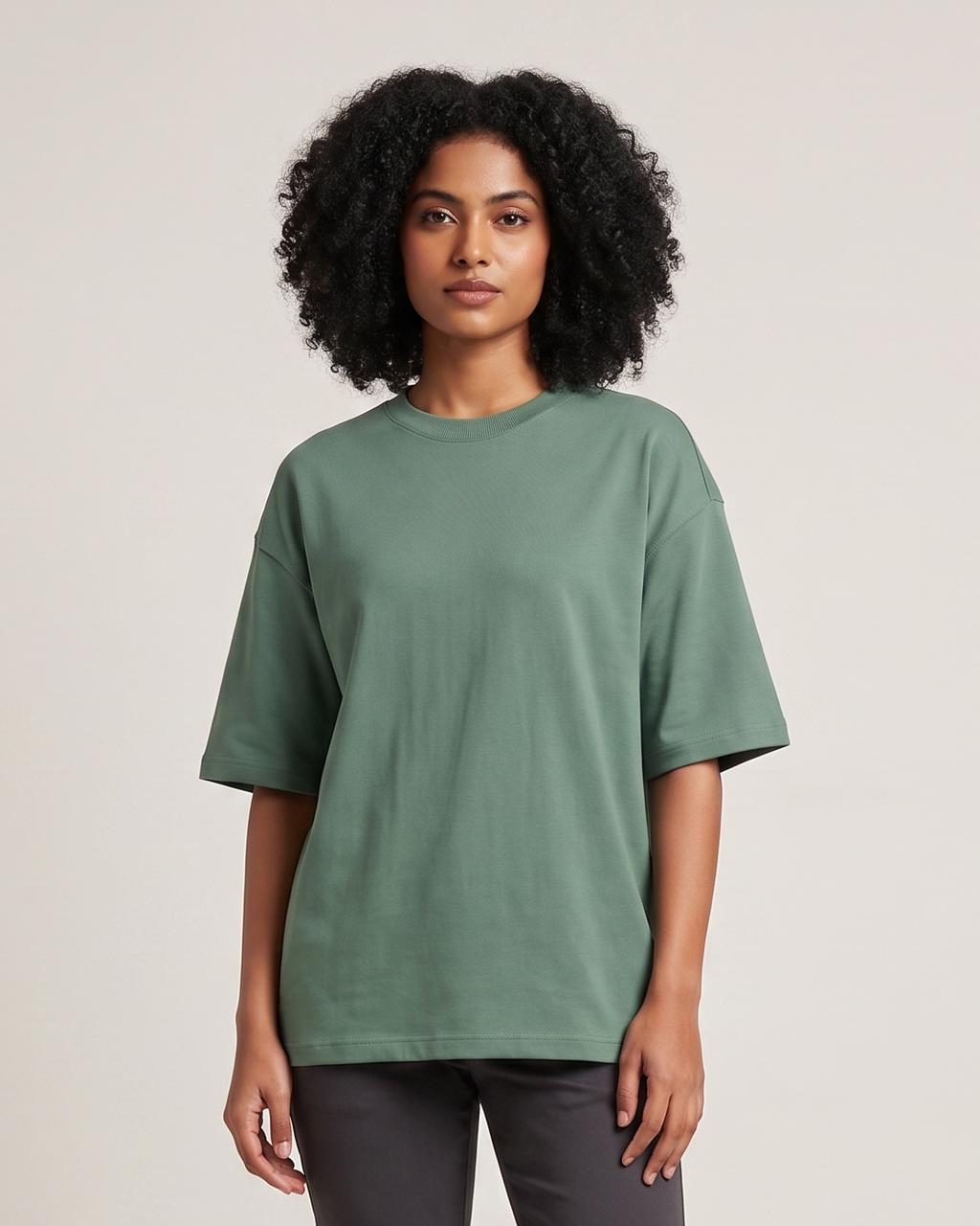 Green - Chapter26 premium oversized graphic t-shirt, worn by a female model