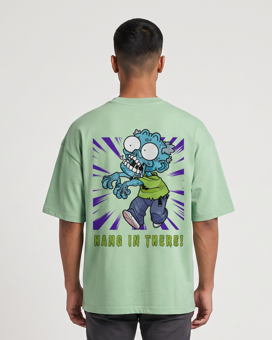 Hang In There - Jade - Chapter26 premium oversized graphic t-shirt, back print, worn by a model