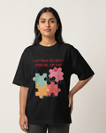 Loving Every Piece of Me - Black - Chapter26 premium oversized graphic t-shirt, worn by a female model