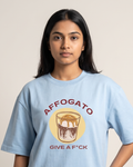 Affogato Give A F*CK - Baby Blue - Chapter26 premium oversized graphic t-shirt, worn by a female model