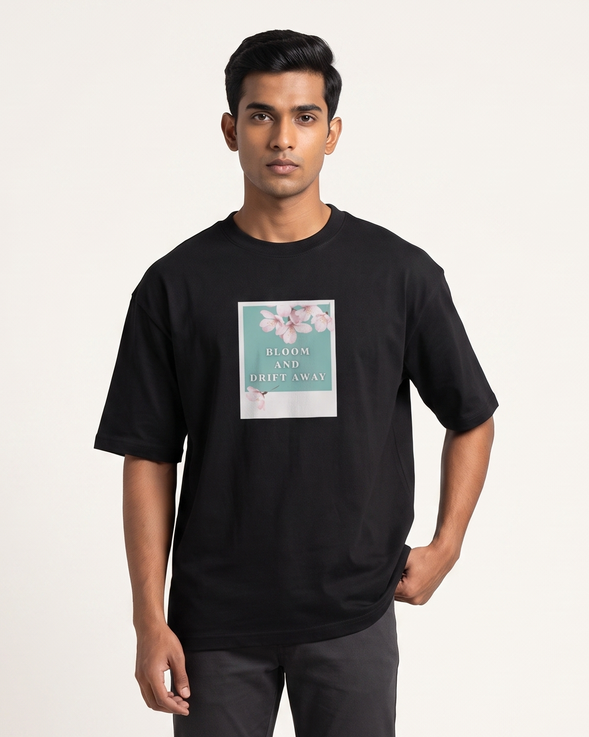 Bloom and Drift Away - Black - Chapter26 premium oversized graphic t-shirt, worn by a model