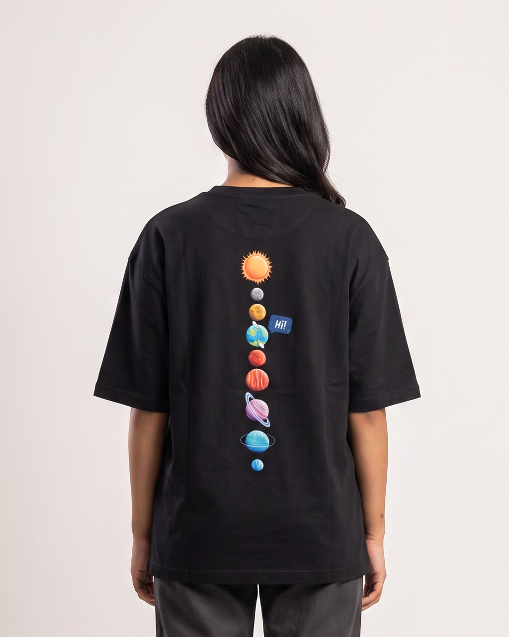 Universal Welcome - Black - Chapter26 premium oversized graphic t-shirt, back print, worn by a female model