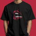 Luscious Red - Chapter26 black oversized unisex t-shirt with a red lips front print, worn by a model