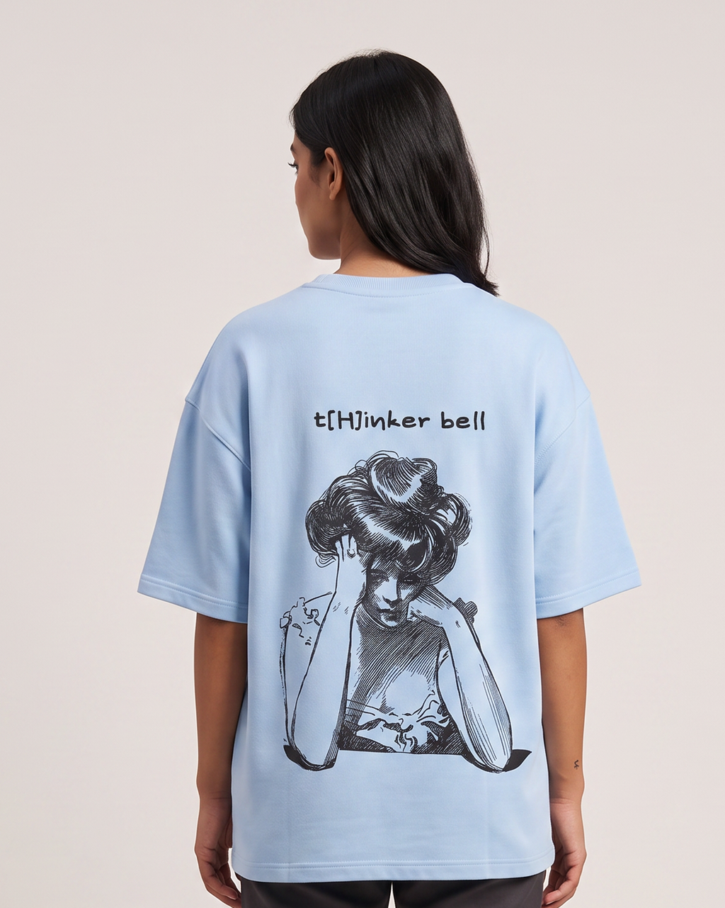 Thinker Bell - Baby Blue - Chapter26 premium oversized graphic t-shirt, back print, worn by a female model