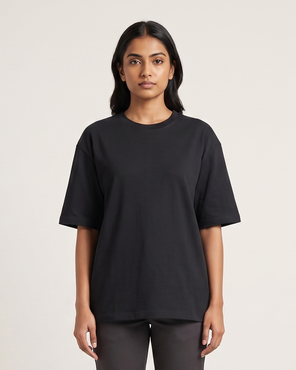 Black - Chapter26 premium oversized graphic t-shirt, worn by a female model