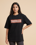 Damaged oversized t-shirt on model - Black