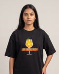 Aperol Spritz - Black - Chapter26 premium oversized graphic t-shirt, worn by a female model