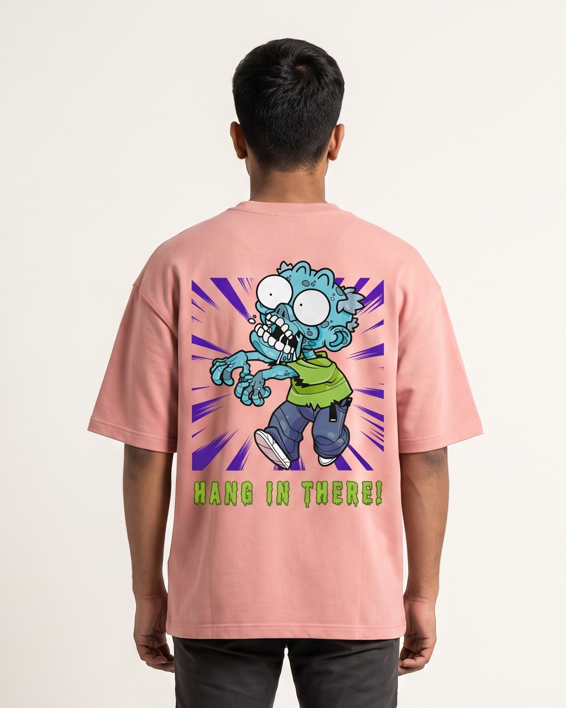 Hang In There - Flamingo - Chapter26 premium oversized graphic t-shirt, back print, worn by a model