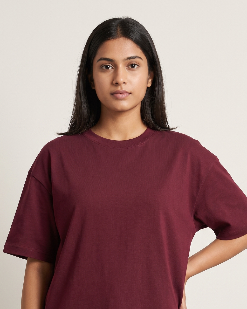 Mega Maroon - Chapter26 premium oversized graphic t-shirt, worn by a female model