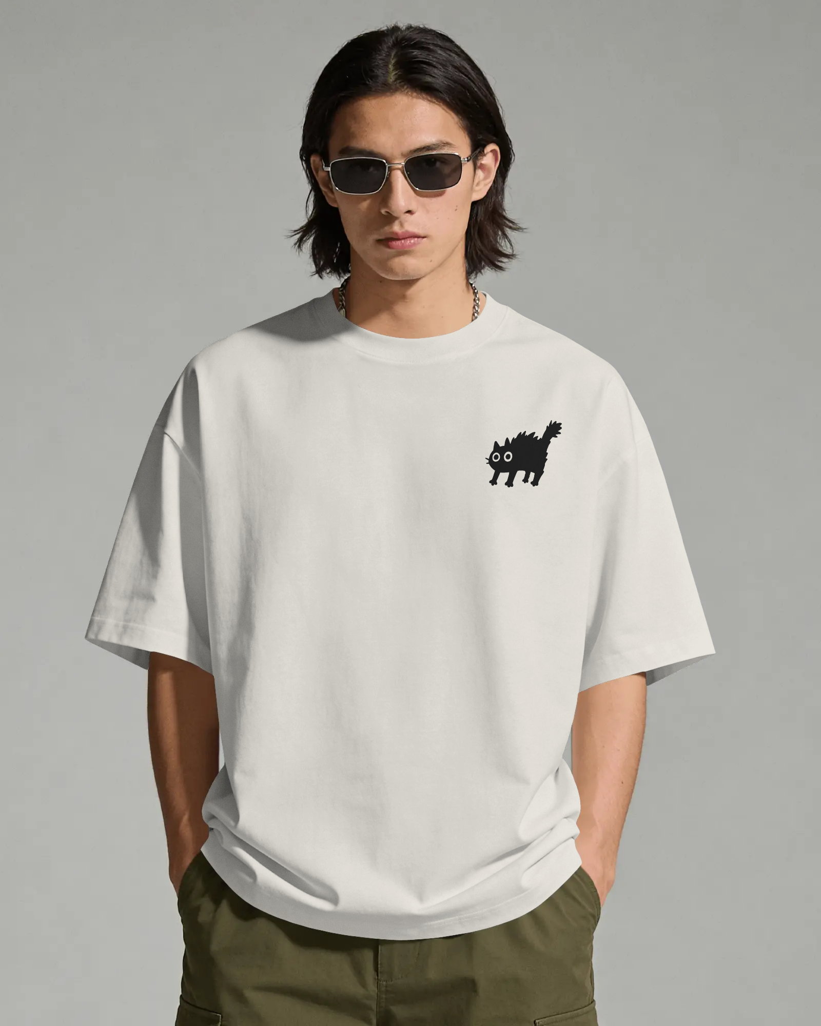 Freaky Cat - Chapter26 premium oversized graphic t-shirt worn by a model, front view