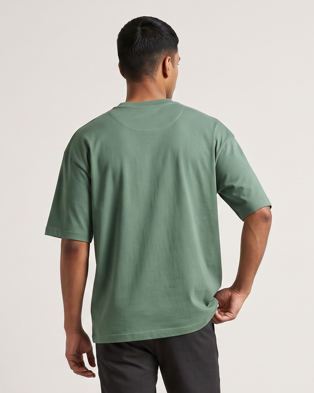 Green oversized t-shirt back on model