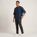 Model wearing New Navy oversized t-shirt, front three-quarter view