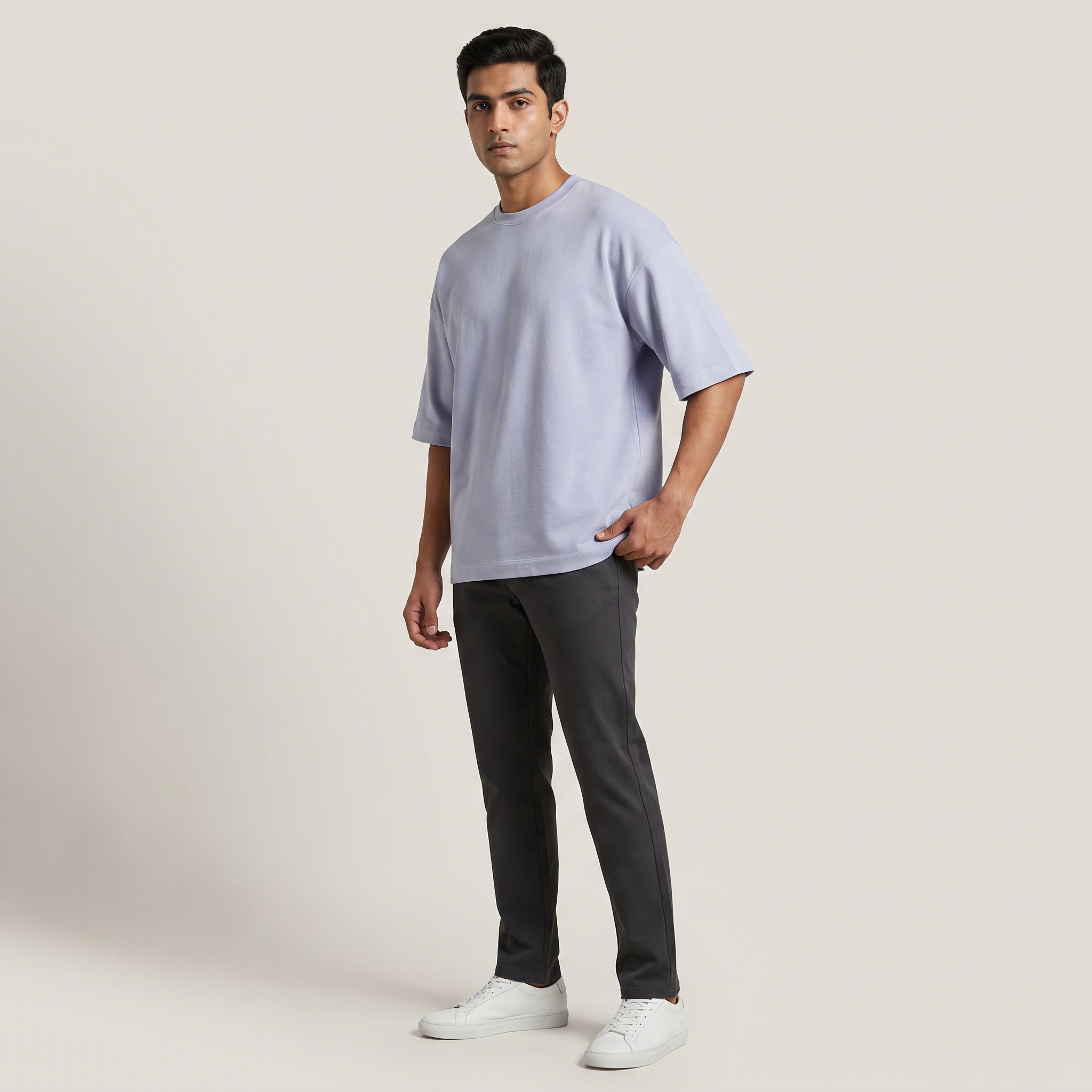 Model wearing Laid Lavender oversized t-shirt, front three-quarter view