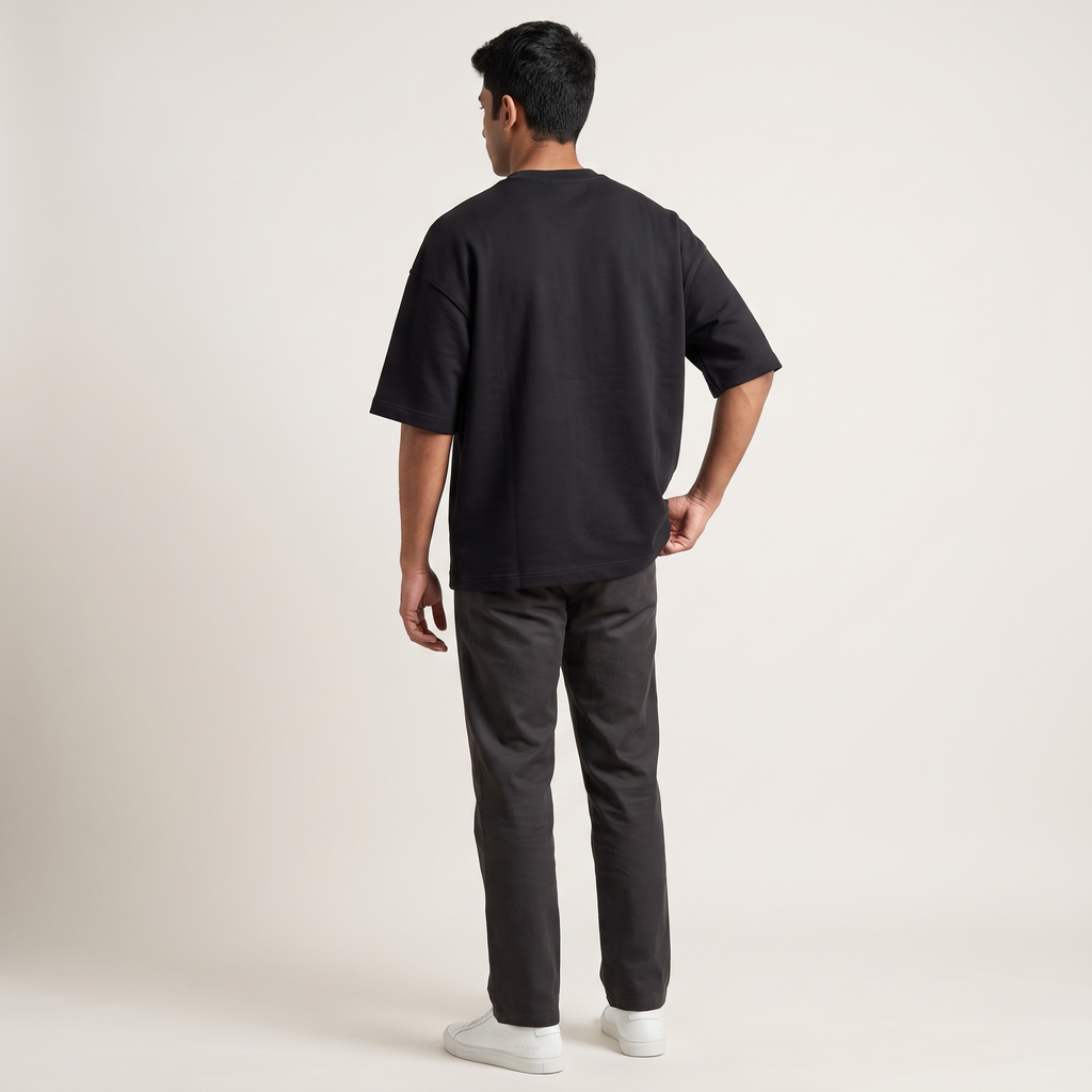 Model wearing Basic Black oversized t-shirt, back view