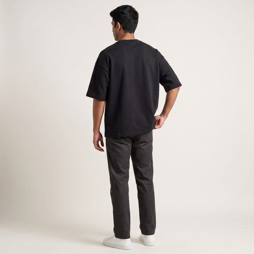 Model wearing Basic Black oversized t-shirt, back view