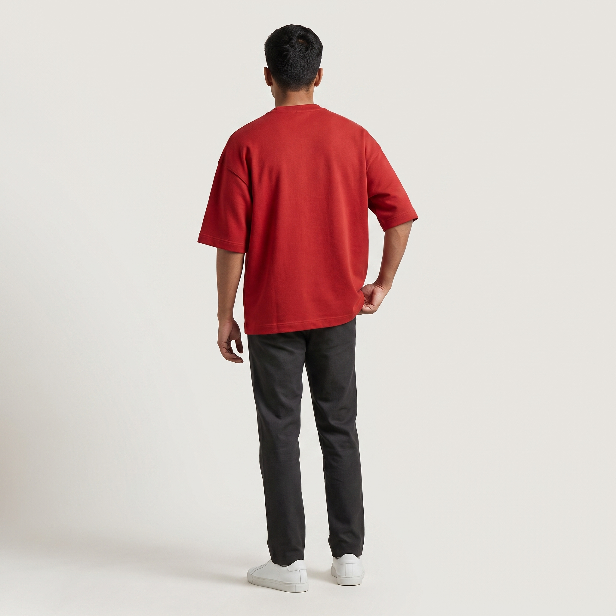 Model wearing Red Rush oversized t-shirt, back view