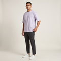 Model wearing Lavender classic oversized t-shirt, front three-quarter view