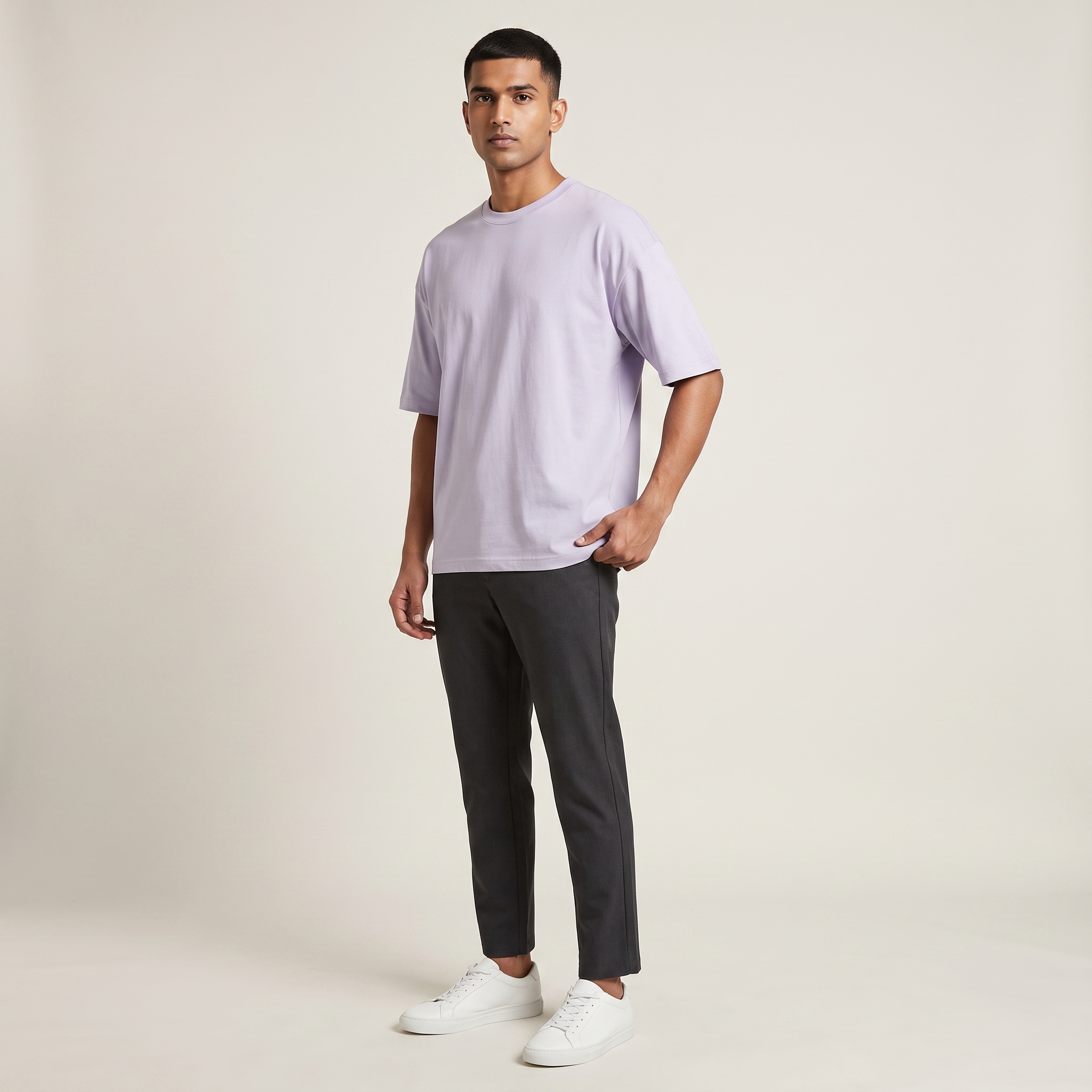 Model wearing Lavender classic oversized t-shirt, front three-quarter view