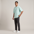 Model wearing Mint classic oversized t-shirt, front three-quarter view