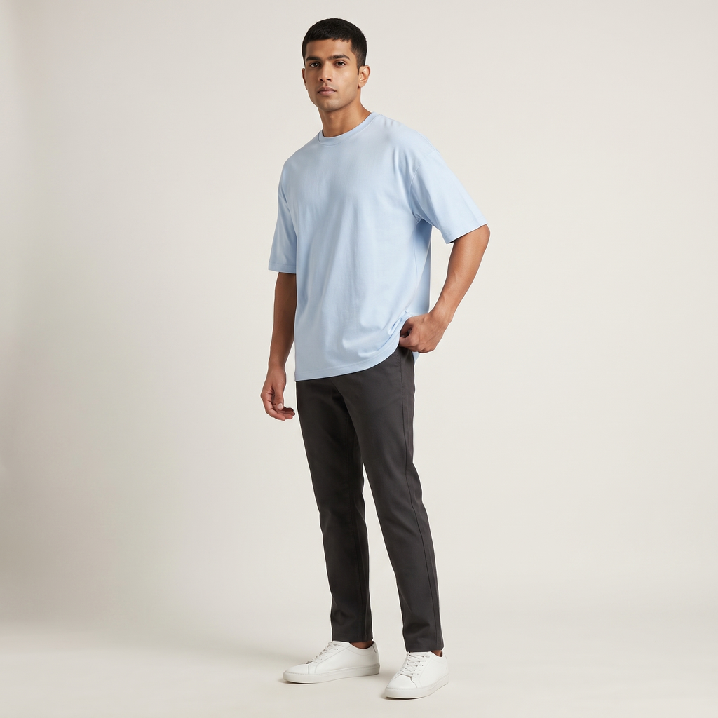Model wearing Powder Blue classic oversized t-shirt, front three-quarter view