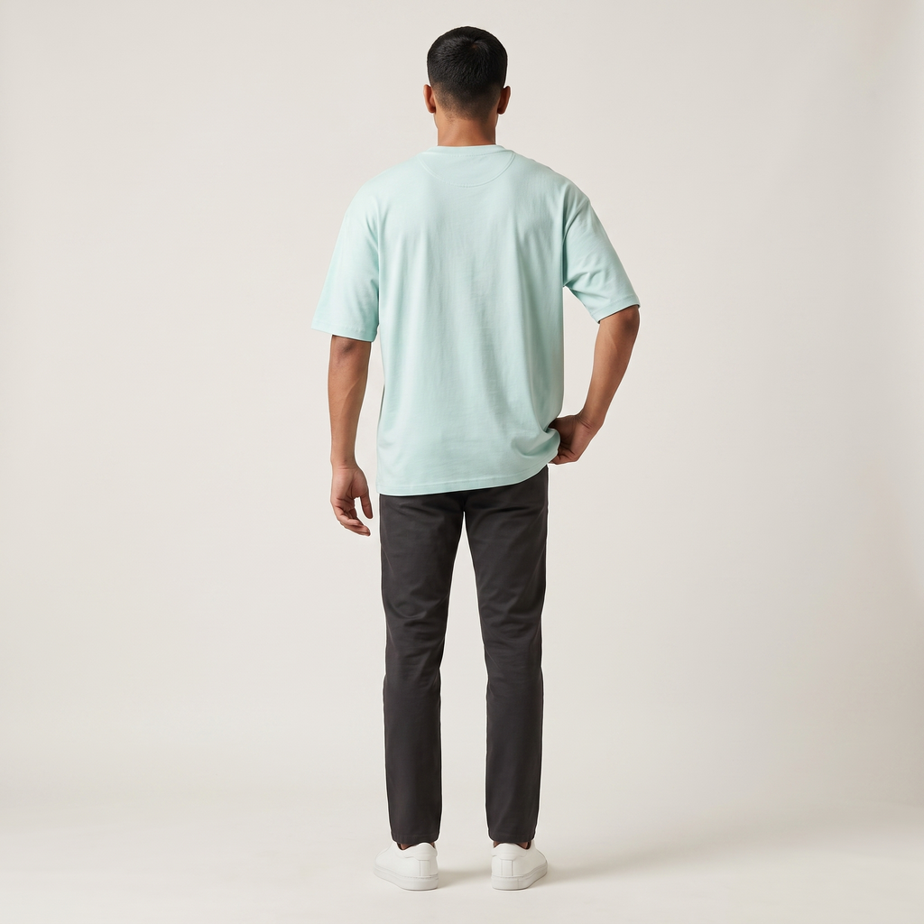 Model wearing Mint classic oversized t-shirt, back view