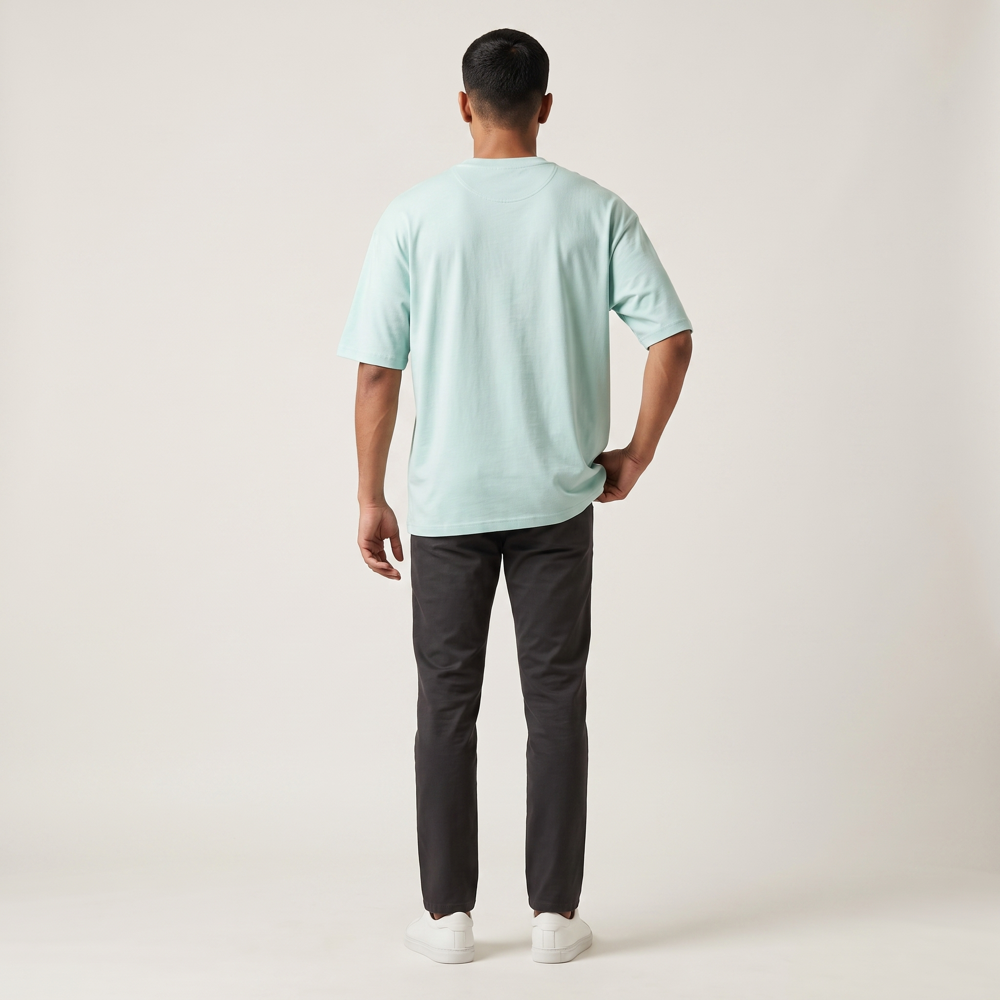 Model wearing Mint classic oversized t-shirt, back view