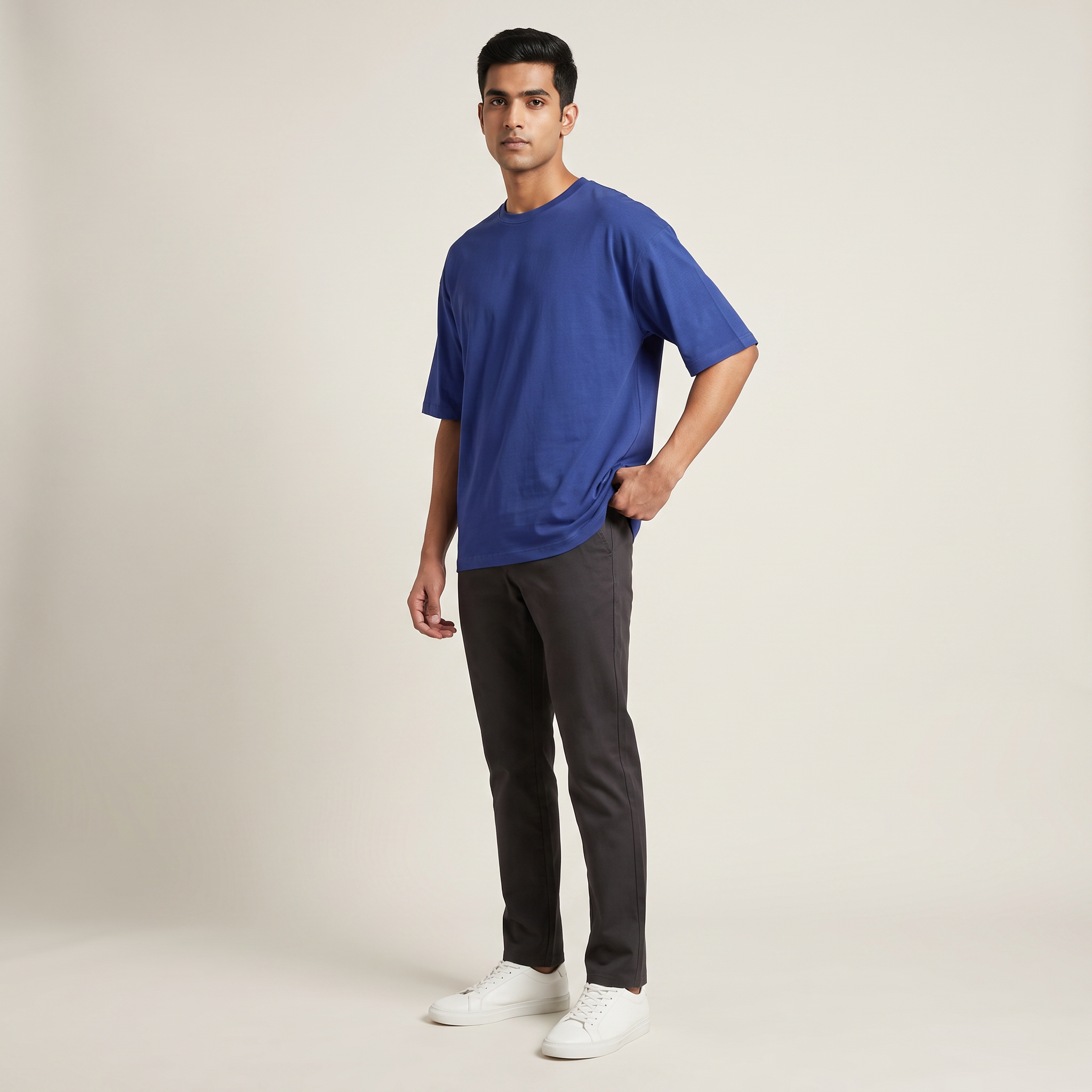 Model wearing Royal Blue classic oversized t-shirt, front three-quarter view