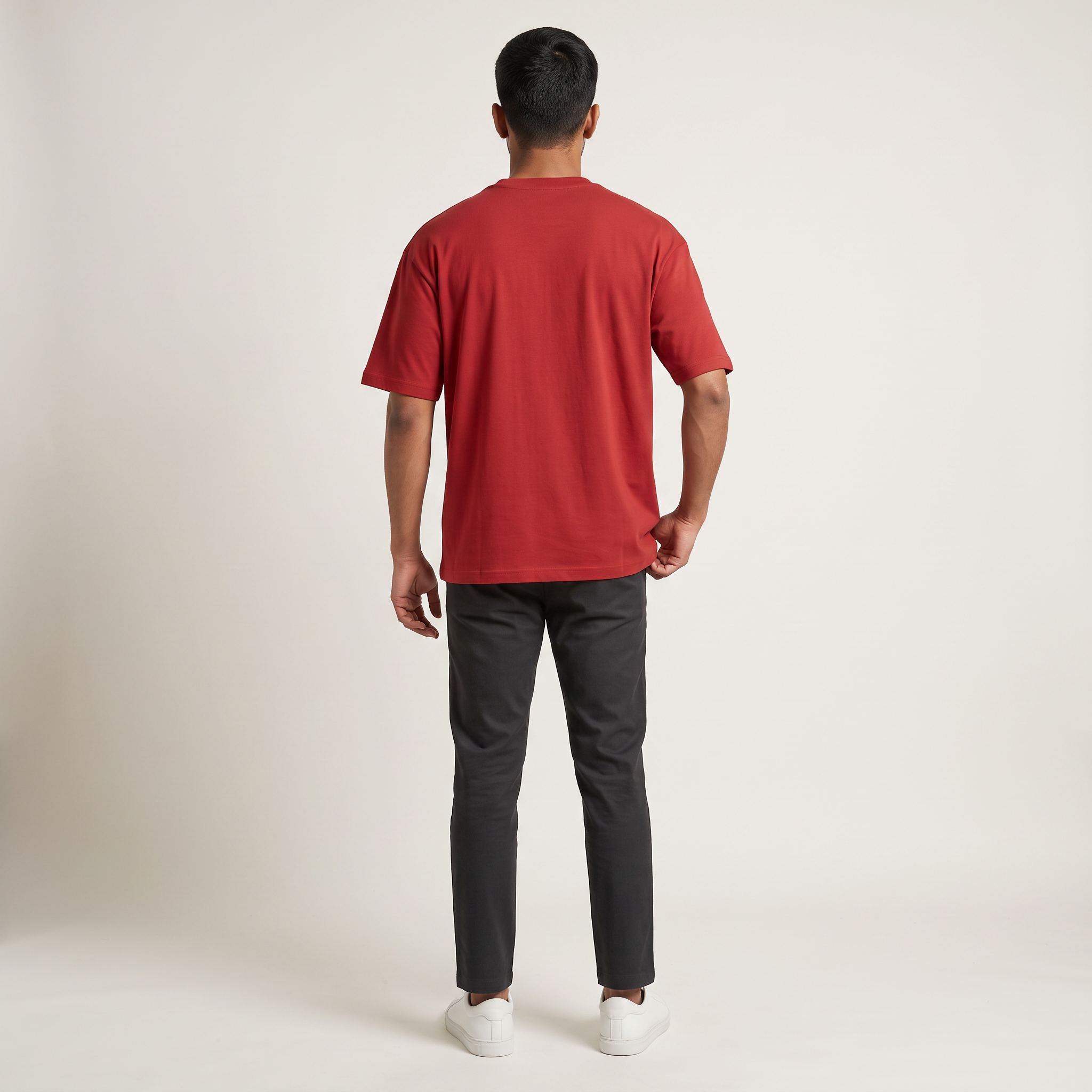 Model wearing Classic Red oversized t-shirt, back view
