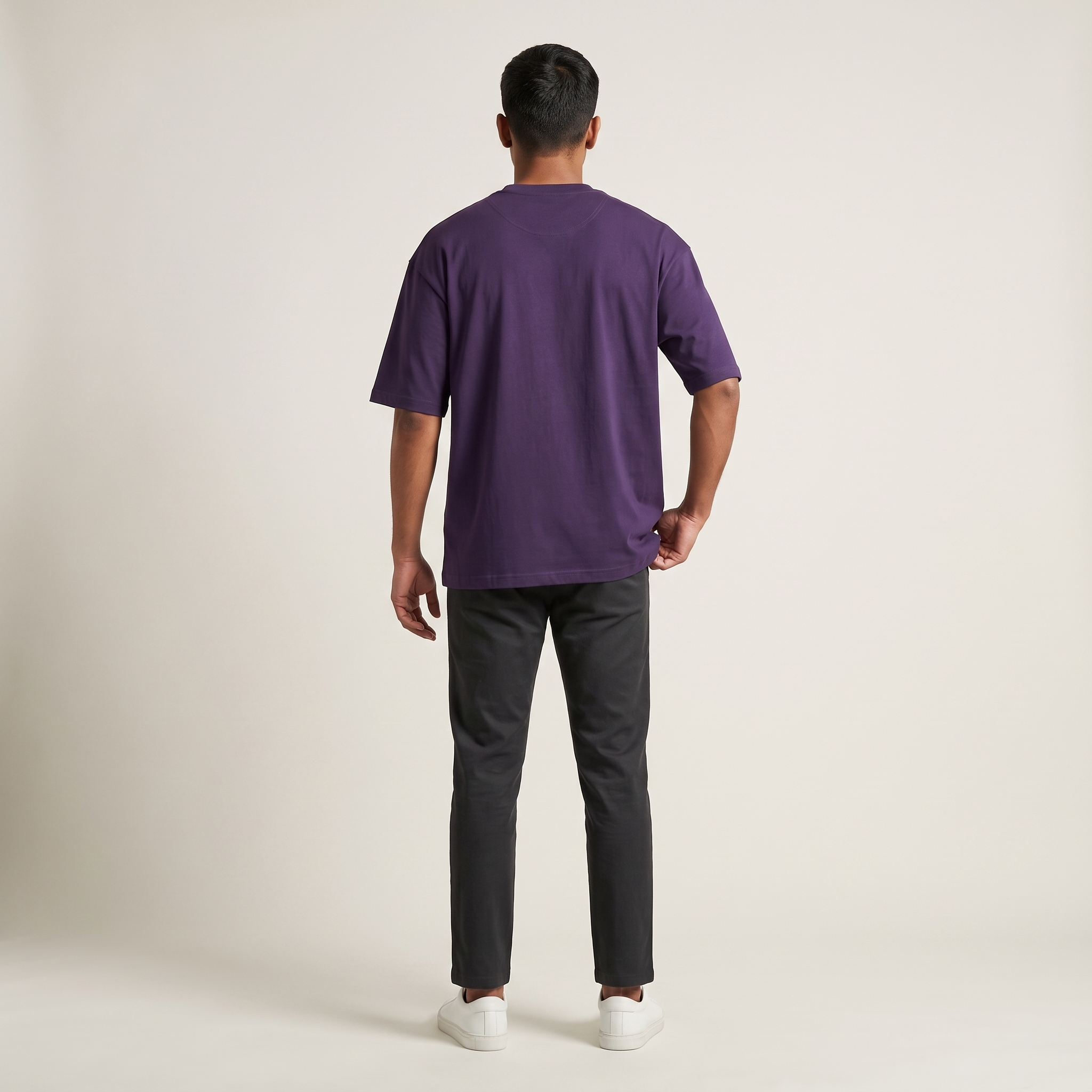 Model wearing Purple classic oversized t-shirt, back view