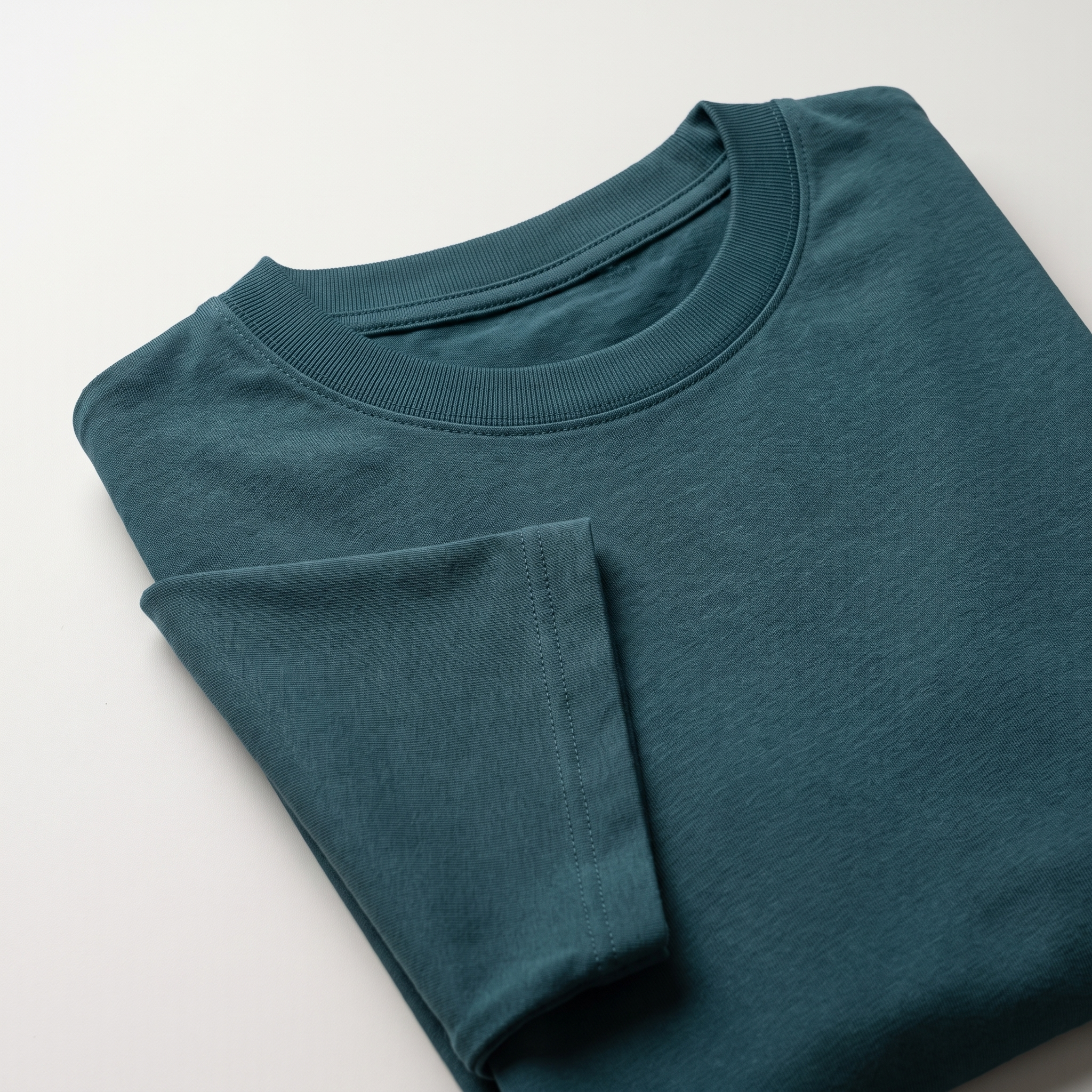 Petrol Blue classic oversized t-shirt, folded fabric detail