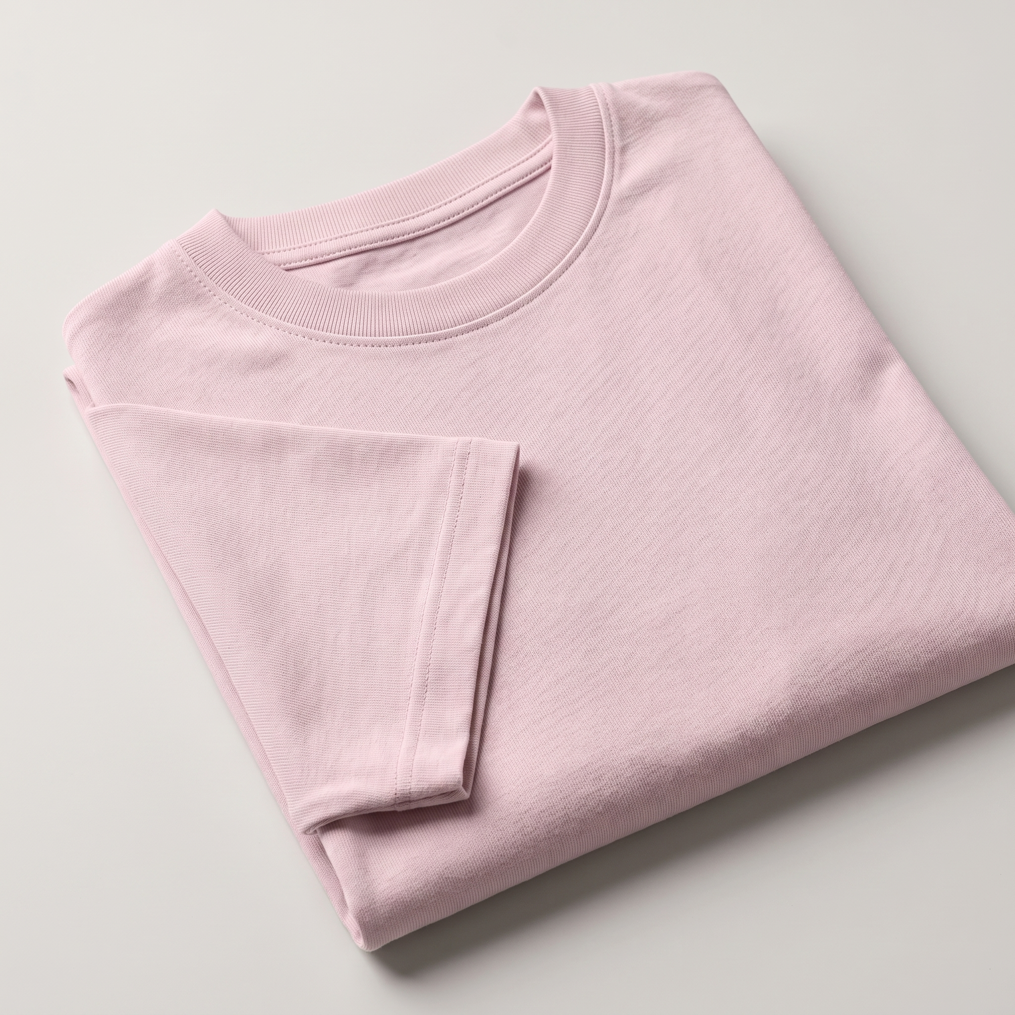Classic Baby Pink oversized t-shirt, folded fabric detail