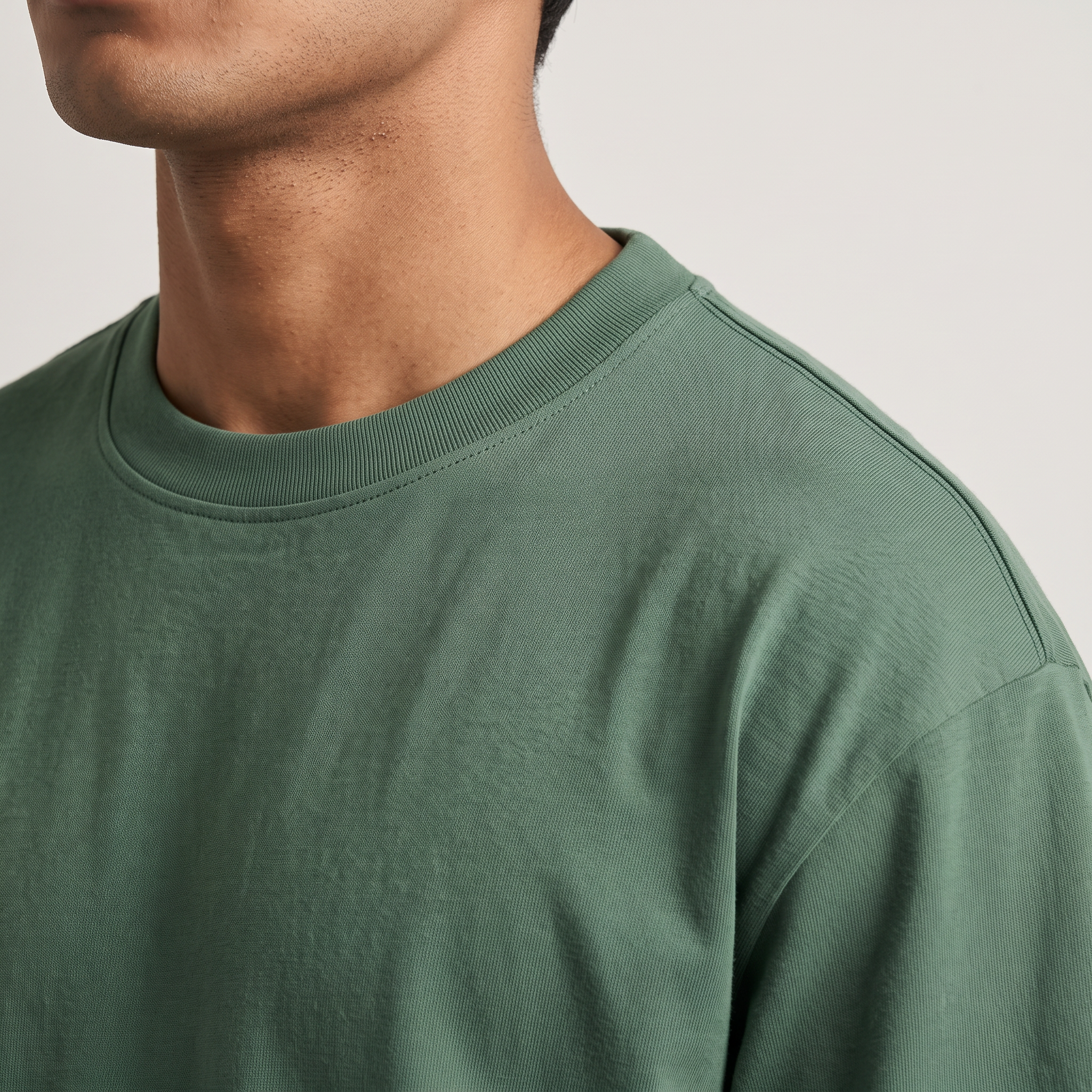 Green classic oversized t-shirt, collar and shoulder seam fabric detail