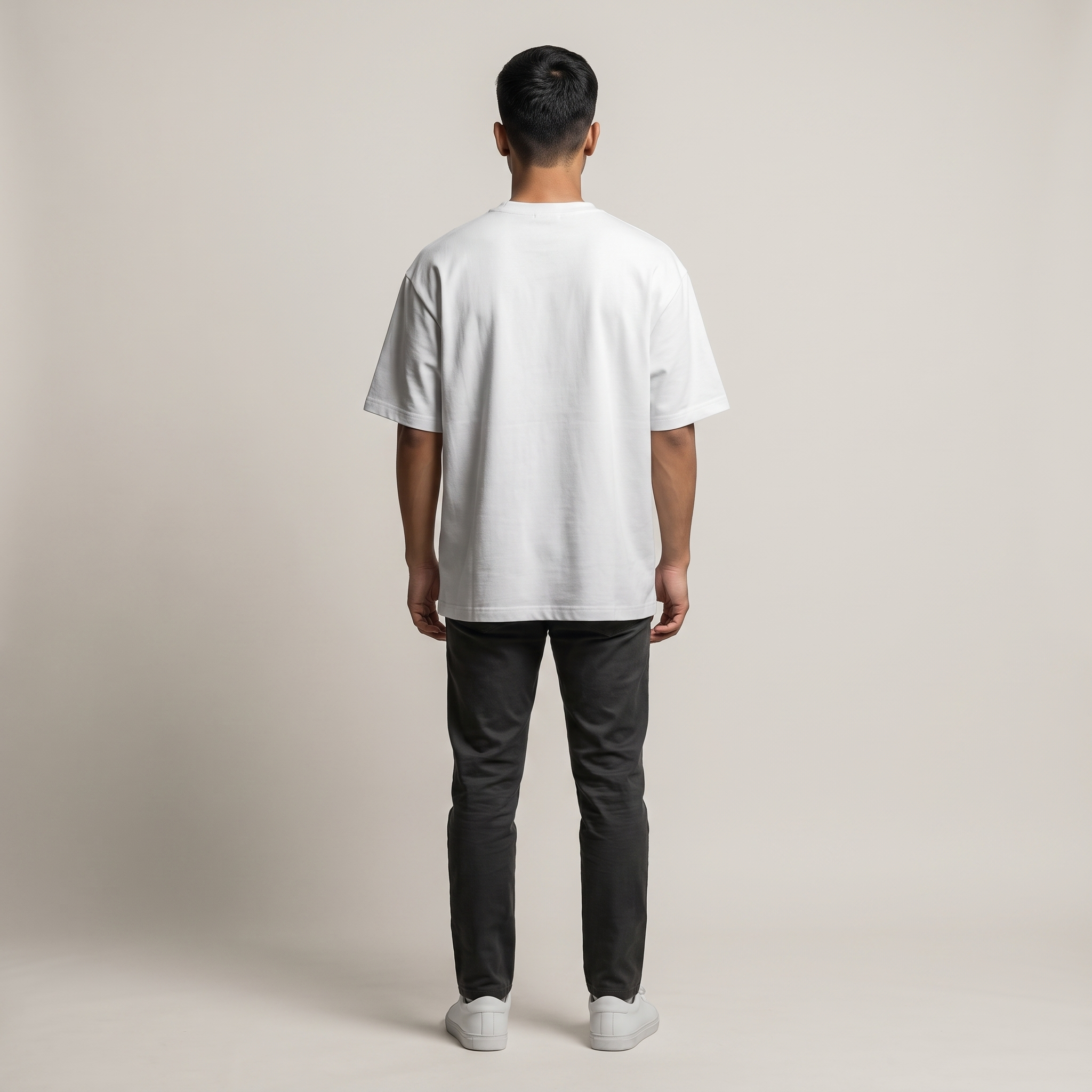 Model wearing Hustle Light oversized t-shirt, back view