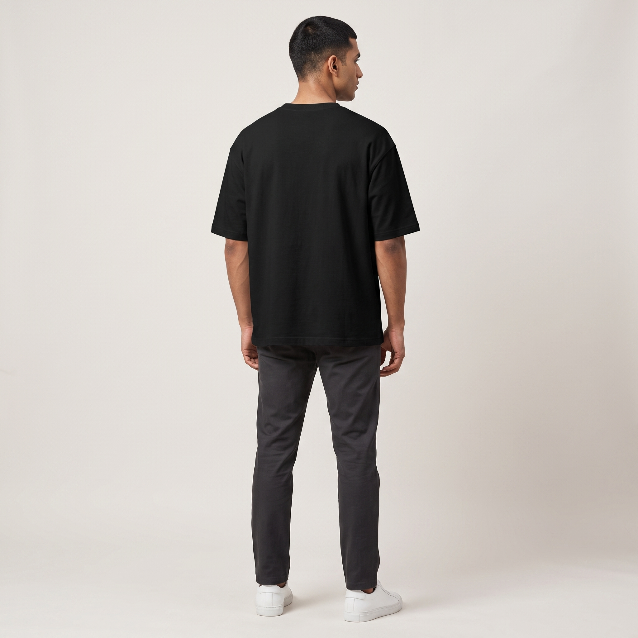 Model wearing K-Love oversized t-shirt, back view