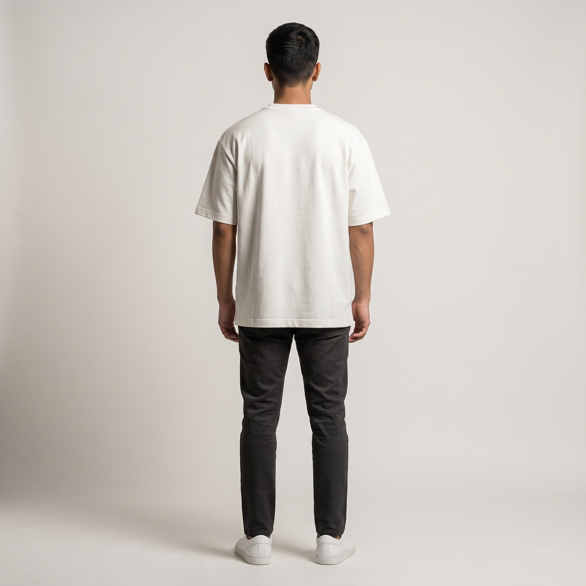 Model wearing No Buri Nazar oversized t-shirt, back view