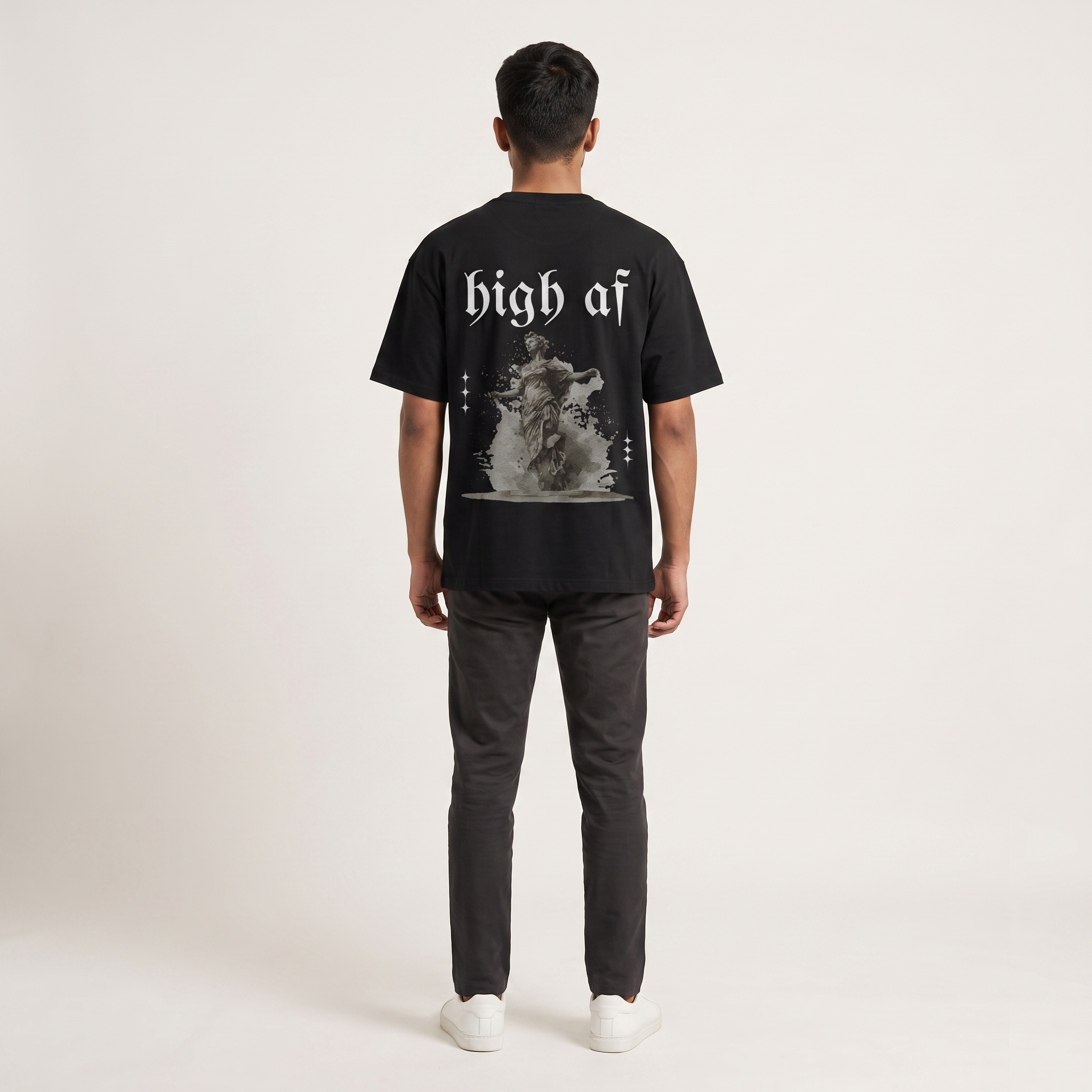 Model wearing High AF Dark oversized t-shirt, back view showing back print