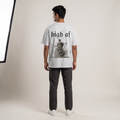 Model wearing High AF Light oversized t-shirt, back view showing back print