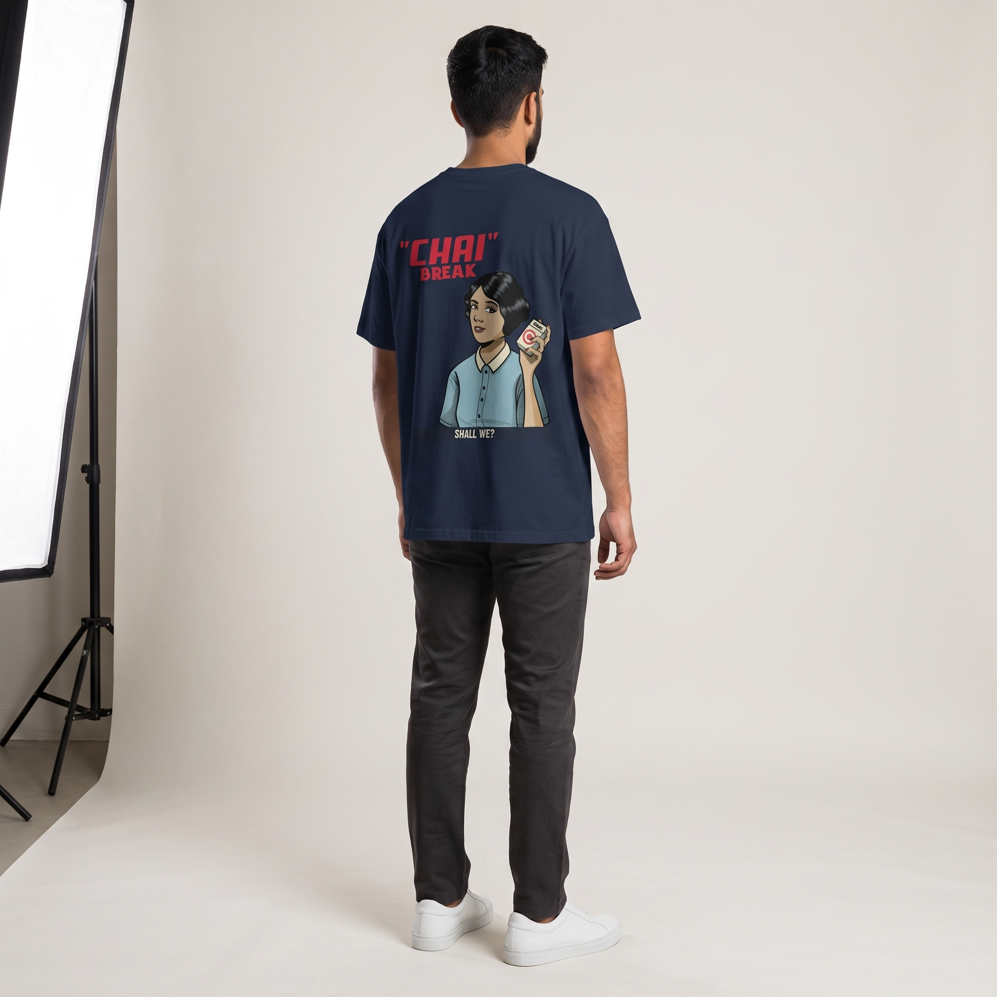 Model wearing Chai Break oversized t-shirt, back view showing back print