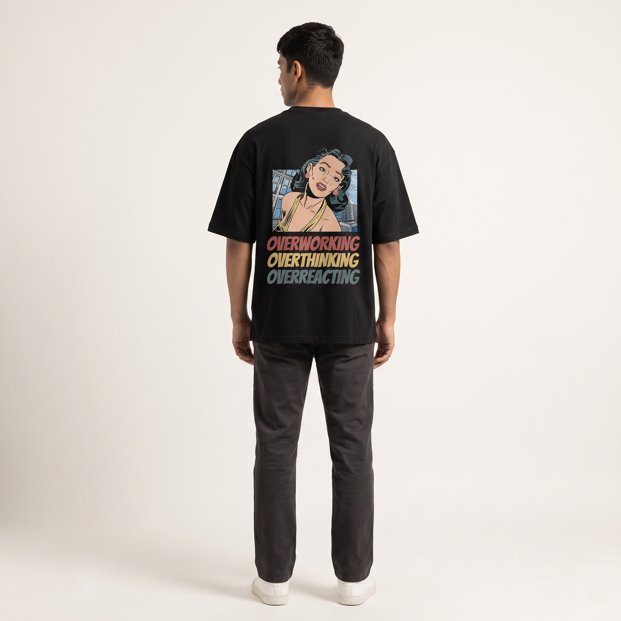 Model wearing Overworking oversized t-shirt, back view showing back print