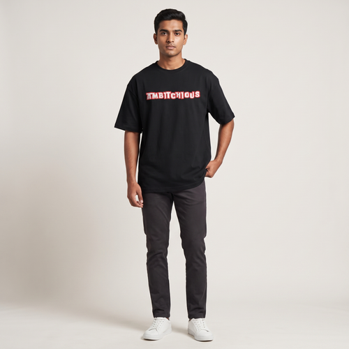 Model wearing Ambitchious oversized t-shirt, front view showing chest print