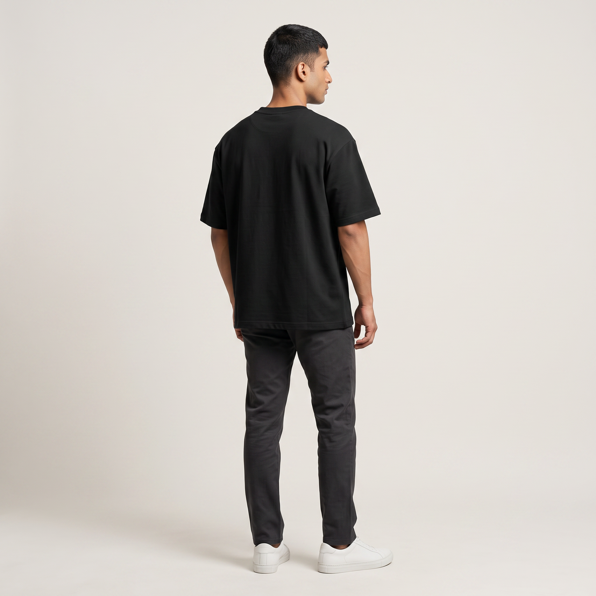 Model wearing Need a Break oversized t-shirt, back view