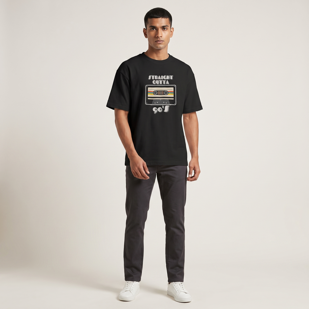 Model wearing Straight Outta 90s oversized t-shirt, front view showing chest print